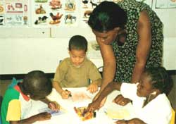 Teacher and children at the Association for Children with Language, Speech and Hearing Impairment, CLASH  Windhoek Namibia