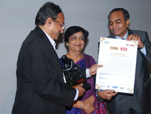 Dr Baliga (left) receiving his award