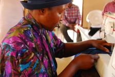 Members of the Maliyadma support group make school uniforms for orphans.  Many of the group are grandparents caring for children who have lost their parents to AIDS.  Maliyadma is a member of SWANNEPHA.  